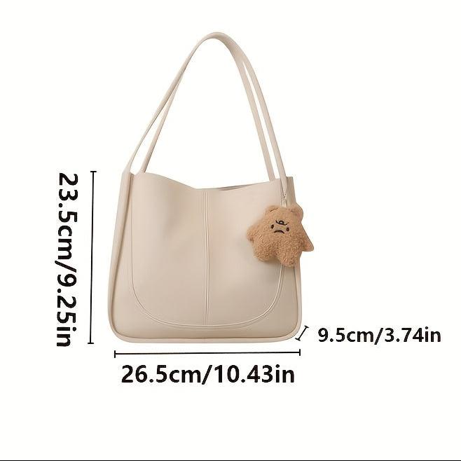 Bolsa Tote Preta de Couro Sintético com Pingente de Urso – Grande, Versátil e Elegante para Trabalho e Dia a Dia